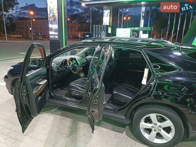 Черный Лексус РХ, объемом двигателя 3.46 л и пробегом 170 тыс. км за 11700 $, фото 18 на Automoto.ua