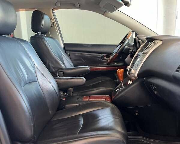 Черный Лексус РХ, объемом двигателя 3.5 л и пробегом 138 тыс. км за 12999 $, фото 3 на Automoto.ua