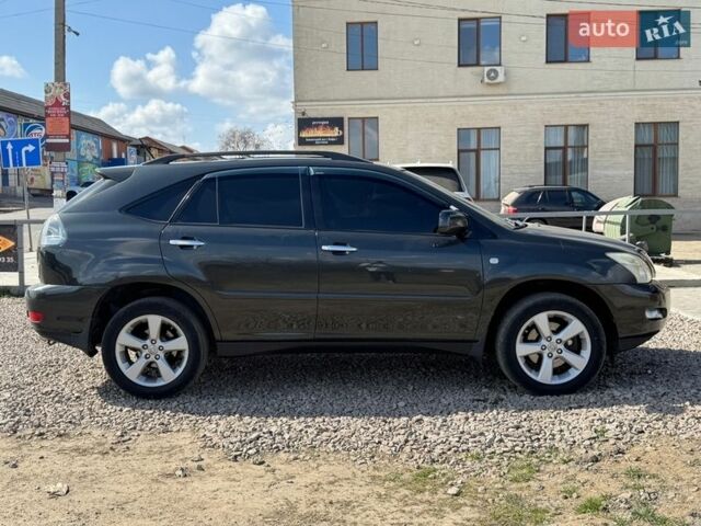 Черный Лексус РХ, объемом двигателя 3.46 л и пробегом 246 тыс. км за 8300 $, фото 2 на Automoto.ua