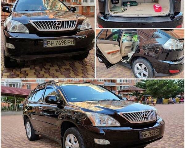 Черный Лексус РХ, объемом двигателя 3.46 л и пробегом 235 тыс. км за 13300 $, фото 1 на Automoto.ua