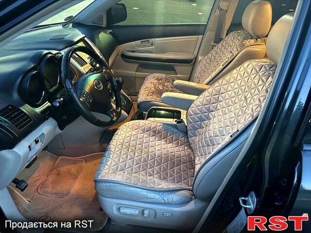 Черный Лексус РХ, объемом двигателя 3.5 л и пробегом 247 тыс. км за 9999 $, фото 7 на Automoto.ua