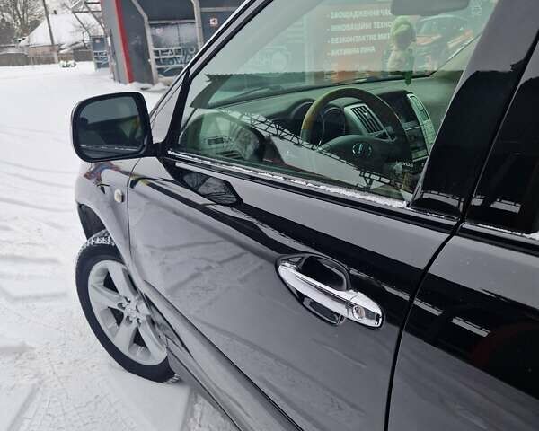 Черный Лексус РХ, объемом двигателя 3.46 л и пробегом 161 тыс. км за 11500 $, фото 2 на Automoto.ua