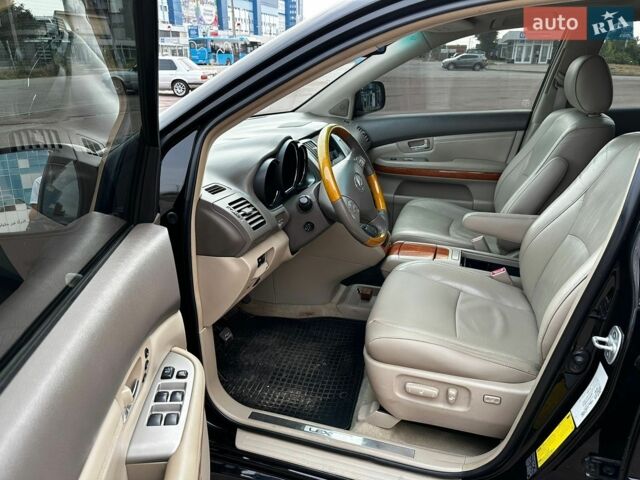 Черный Лексус РХ, объемом двигателя 3.46 л и пробегом 247 тыс. км за 11400 $, фото 6 на Automoto.ua