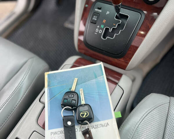 Черный Лексус РХ, объемом двигателя 3.46 л и пробегом 195 тыс. км за 12000 $, фото 20 на Automoto.ua