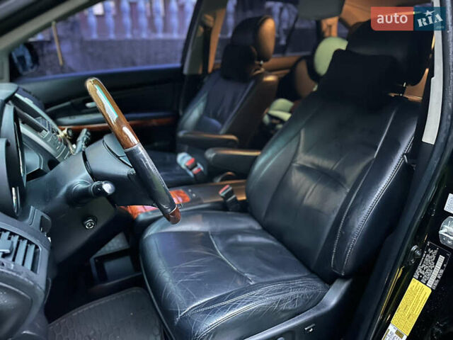 Черный Лексус РХ, объемом двигателя 3.46 л и пробегом 217 тыс. км за 14500 $, фото 37 на Automoto.ua