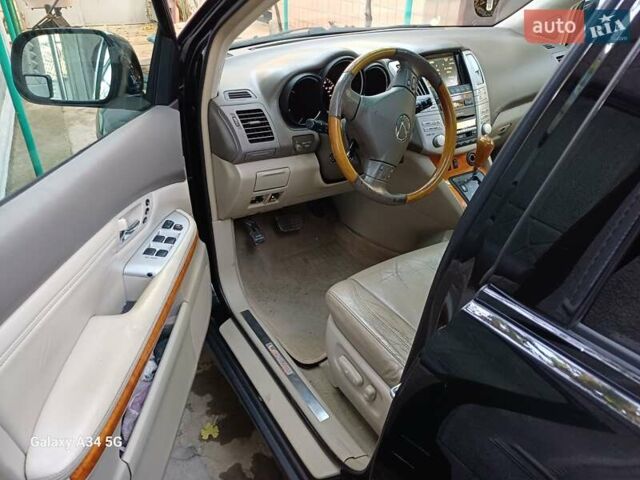 Черный Лексус РХ, объемом двигателя 3.46 л и пробегом 280 тыс. км за 11500 $, фото 13 на Automoto.ua