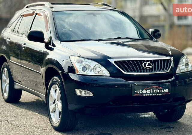 Черный Лексус РХ, объемом двигателя 3.46 л и пробегом 254 тыс. км за 9499 $, фото 1 на Automoto.ua