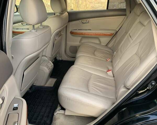 Черный Лексус РХ, объемом двигателя 3.46 л и пробегом 340 тыс. км за 11000 $, фото 11 на Automoto.ua