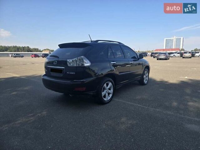 Черный Лексус РХ, объемом двигателя 3.46 л и пробегом 285 тыс. км за 11300 $, фото 4 на Automoto.ua