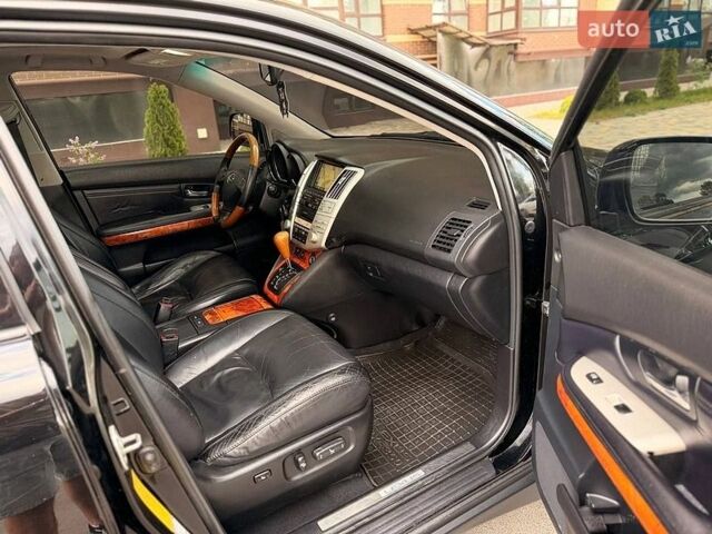Черный Лексус РХ, объемом двигателя 3.5 л и пробегом 247 тыс. км за 11500 $, фото 67 на Automoto.ua