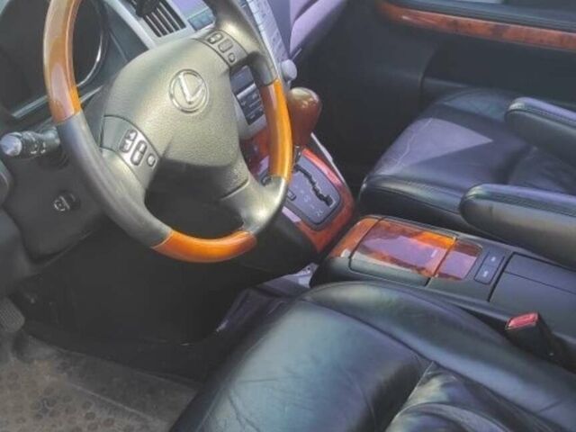 Черный Лексус РХ, объемом двигателя 3.5 л и пробегом 206 тыс. км за 11500 $, фото 3 на Automoto.ua