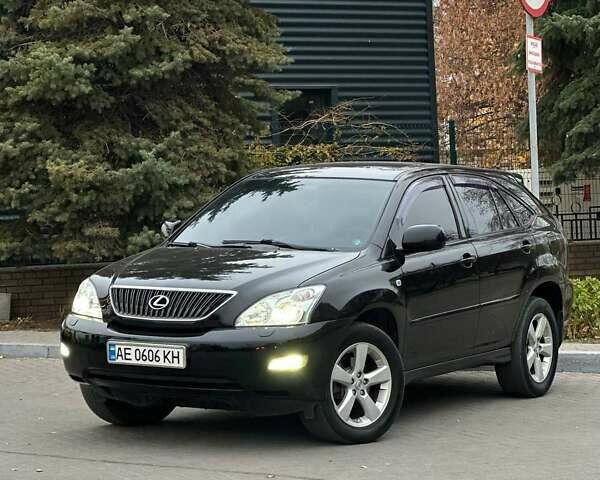 Черный Лексус РХ, объемом двигателя 3.5 л и пробегом 233 тыс. км за 11499 $, фото 1 на Automoto.ua