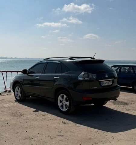 Черный Лексус РХ, объемом двигателя 3.46 л и пробегом 246 тыс. км за 7999 $, фото 1 на Automoto.ua