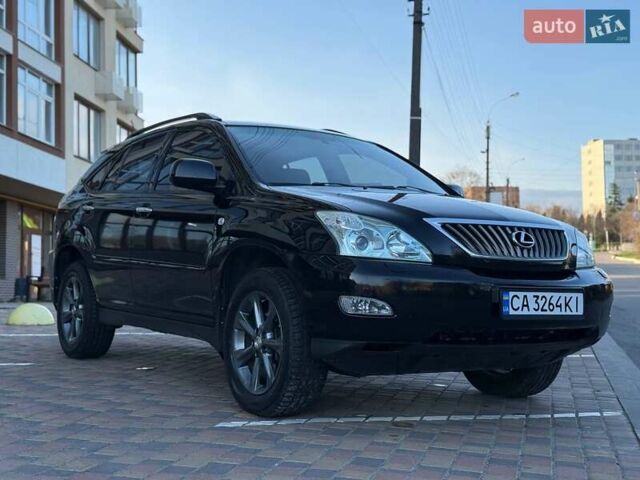 Черный Лексус РХ, объемом двигателя 3.46 л и пробегом 190 тыс. км за 12500 $, фото 1 на Automoto.ua