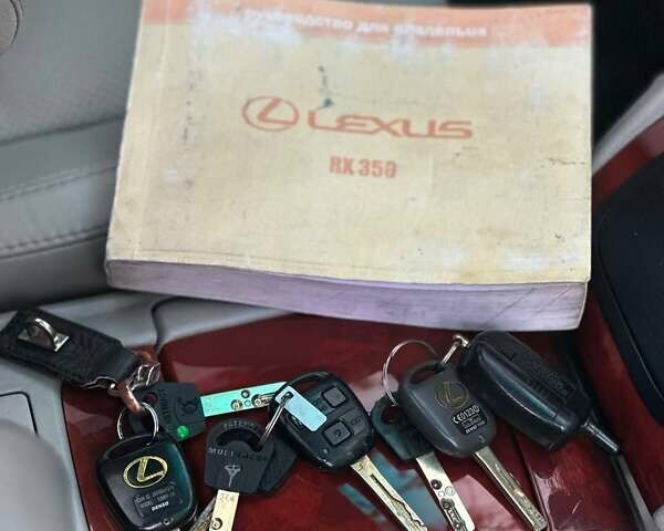 Черный Лексус РХ, объемом двигателя 3.5 л и пробегом 233 тыс. км за 11499 $, фото 19 на Automoto.ua