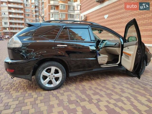 Черный Лексус РХ, объемом двигателя 3.46 л и пробегом 235 тыс. км за 13300 $, фото 11 на Automoto.ua