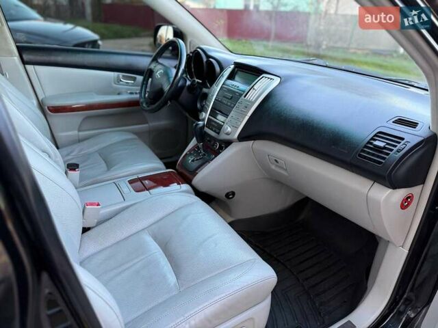 Черный Лексус РХ, объемом двигателя 3.46 л и пробегом 190 тыс. км за 12500 $, фото 64 на Automoto.ua