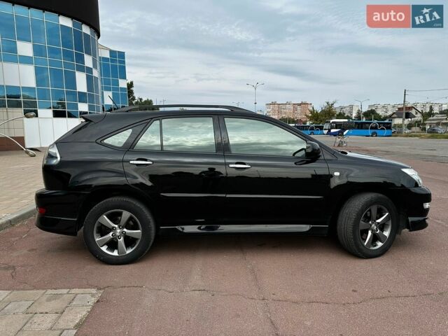 Черный Лексус РХ, объемом двигателя 3.46 л и пробегом 247 тыс. км за 11400 $, фото 2 на Automoto.ua