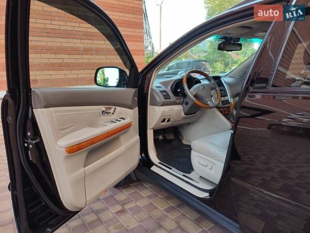 Черный Лексус РХ, объемом двигателя 3.46 л и пробегом 235 тыс. км за 13300 $, фото 8 на Automoto.ua