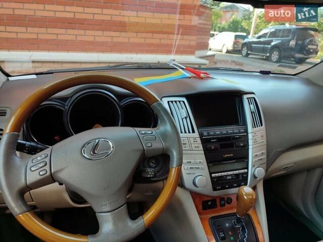 Черный Лексус РХ, объемом двигателя 3.46 л и пробегом 235 тыс. км за 13300 $, фото 4 на Automoto.ua