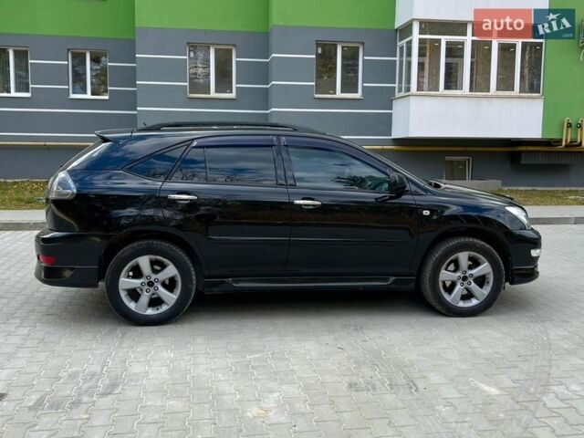 Черный Лексус РХ, объемом двигателя 3.5 л и пробегом 260 тыс. км за 12500 $, фото 3 на Automoto.ua