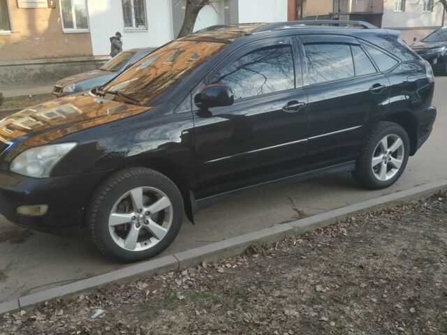 Черный Лексус РХ, объемом двигателя 3.5 л и пробегом 285 тыс. км за 8400 $, фото 1 на Automoto.ua