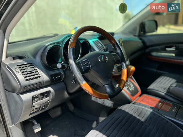 Черный Лексус РХ, объемом двигателя 3.5 л и пробегом 286 тыс. км за 10500 $, фото 12 на Automoto.ua