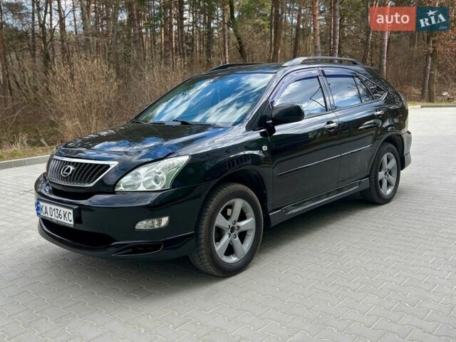Черный Лексус РХ, объемом двигателя 3.5 л и пробегом 260 тыс. км за 12500 $, фото 1 на Automoto.ua