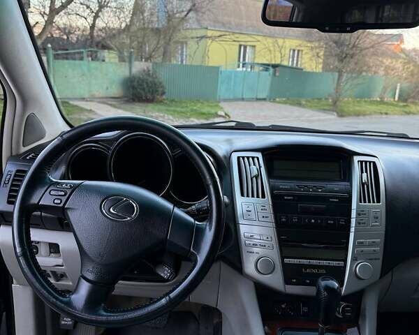 Черный Лексус РХ, объемом двигателя 3.46 л и пробегом 190 тыс. км за 12500 $, фото 61 на Automoto.ua