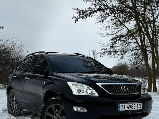 Черный Лексус РХ, объемом двигателя 3.5 л и пробегом 250 тыс. км за 9799 $, фото 2 на Automoto.ua