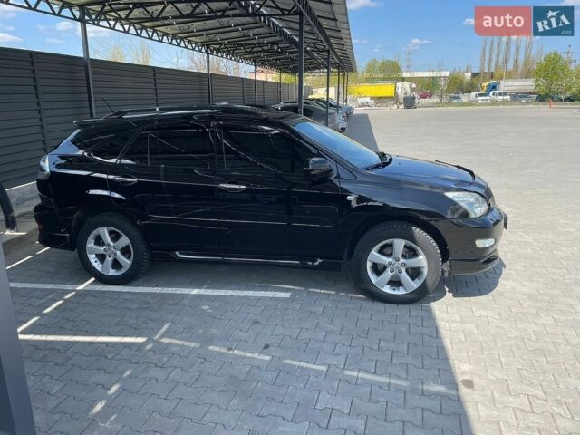 Черный Лексус РХ, объемом двигателя 3.46 л и пробегом 137 тыс. км за 11500 $, фото 1 на Automoto.ua