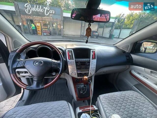 Черный Лексус РХ, объемом двигателя 3.46 л и пробегом 242 тыс. км за 14000 $, фото 2 на Automoto.ua