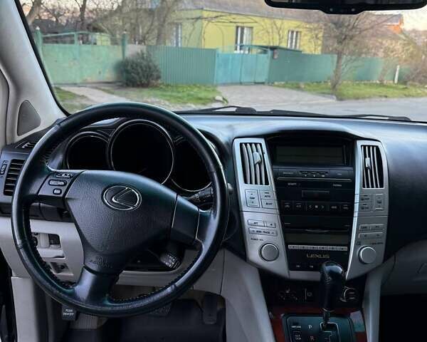 Черный Лексус РХ, объемом двигателя 3.46 л и пробегом 190 тыс. км за 12500 $, фото 59 на Automoto.ua