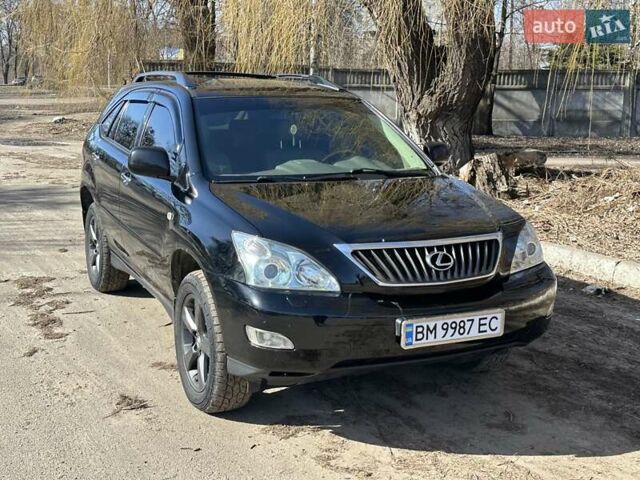 Черный Лексус РХ, объемом двигателя 3.3 л и пробегом 269 тыс. км за 11788 $, фото 4 на Automoto.ua