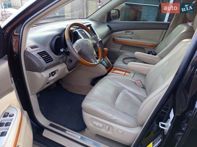 Черный Лексус РХ, объемом двигателя 3.46 л и пробегом 372 тыс. км за 10800 $, фото 5 на Automoto.ua