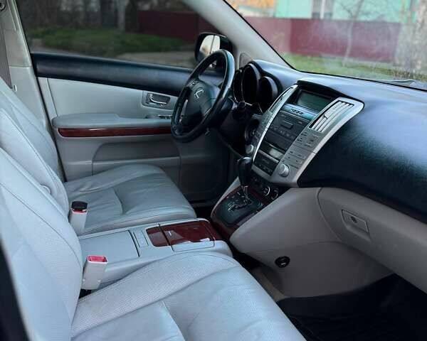 Черный Лексус РХ, объемом двигателя 3.46 л и пробегом 190 тыс. км за 12500 $, фото 63 на Automoto.ua