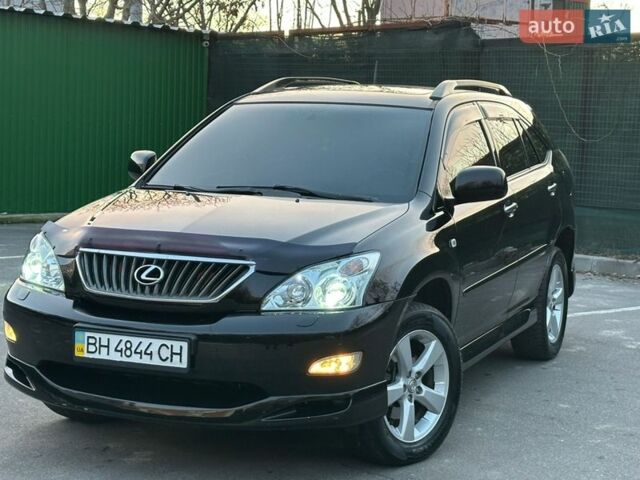 Черный Лексус РХ, объемом двигателя 3.46 л и пробегом 238 тыс. км за 9400 $, фото 1 на Automoto.ua