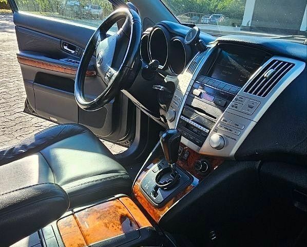 Черный Лексус РХ, объемом двигателя 3.46 л и пробегом 234 тыс. км за 11500 $, фото 23 на Automoto.ua