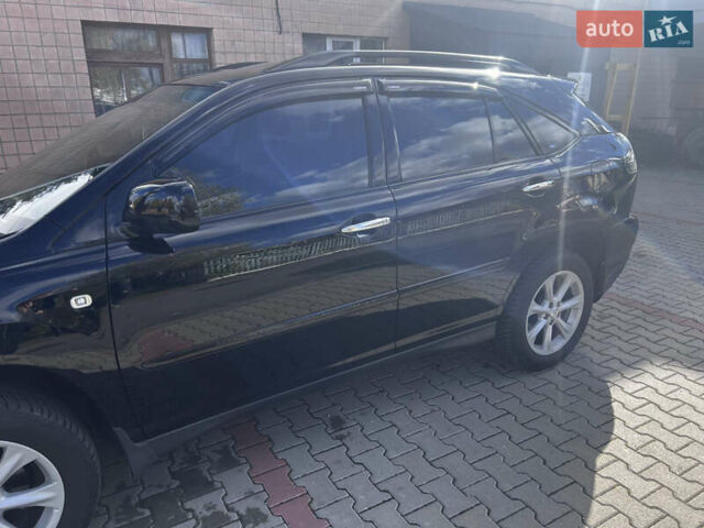 Черный Лексус РХ, объемом двигателя 3.46 л и пробегом 270 тыс. км за 12450 $, фото 4 на Automoto.ua