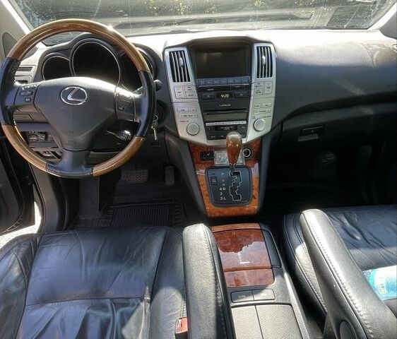 Черный Лексус РХ, объемом двигателя 0 л и пробегом 210 тыс. км за 12553 $, фото 2 на Automoto.ua