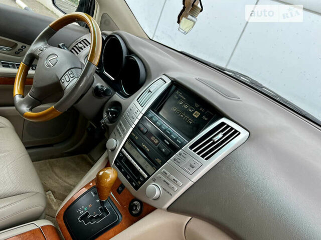 Черный Лексус РХ, объемом двигателя 3.46 л и пробегом 173 тыс. км за 11800 $, фото 52 на Automoto.ua