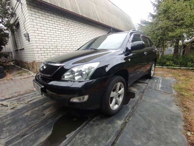 Черный Лексус РХ, объемом двигателя 0 л и пробегом 243 тыс. км за 11500 $, фото 1 на Automoto.ua