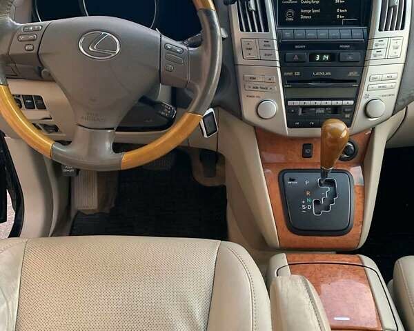Черный Лексус РХ, объемом двигателя 3.46 л и пробегом 340 тыс. км за 11000 $, фото 17 на Automoto.ua