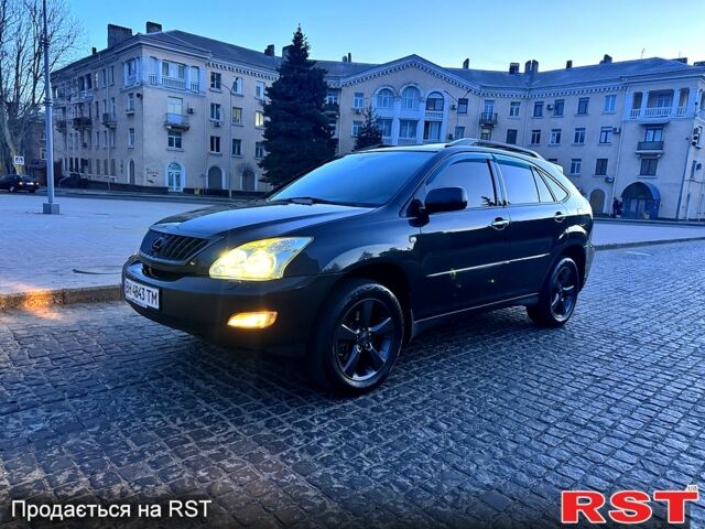 Черный Лексус РХ, объемом двигателя 3.5 л и пробегом 247 тыс. км за 9999 $, фото 1 на Automoto.ua