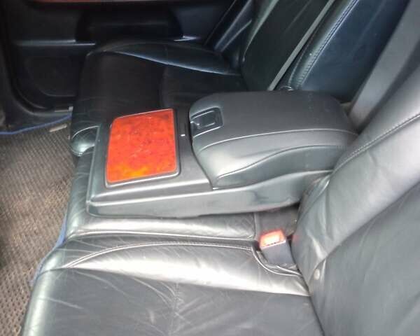 Черный Лексус РХ, объемом двигателя 3.5 л и пробегом 300 тыс. км за 9999 $, фото 1 на Automoto.ua