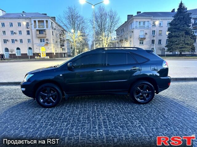 Черный Лексус РХ, объемом двигателя 3.5 л и пробегом 247 тыс. км за 9999 $, фото 3 на Automoto.ua