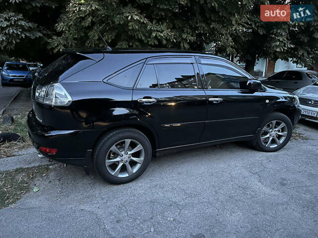Чорний Лексус РХ, об'ємом двигуна 3.46 л та пробігом 205 тис. км за 10800 $, фото 24 на Automoto.ua