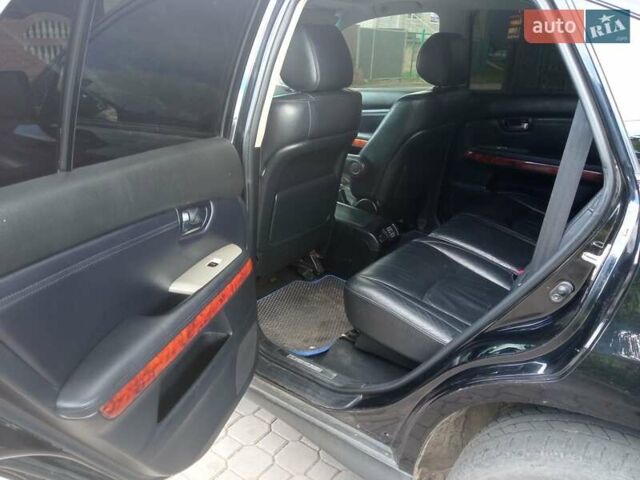 Черный Лексус РХ, объемом двигателя 3.5 л и пробегом 300 тыс. км за 9999 $, фото 4 на Automoto.ua