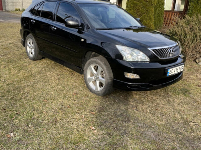 Чорний Лексус РХ, об'ємом двигуна 3.46 л та пробігом 167 тис. км за 13800 $, фото 1 на Automoto.ua