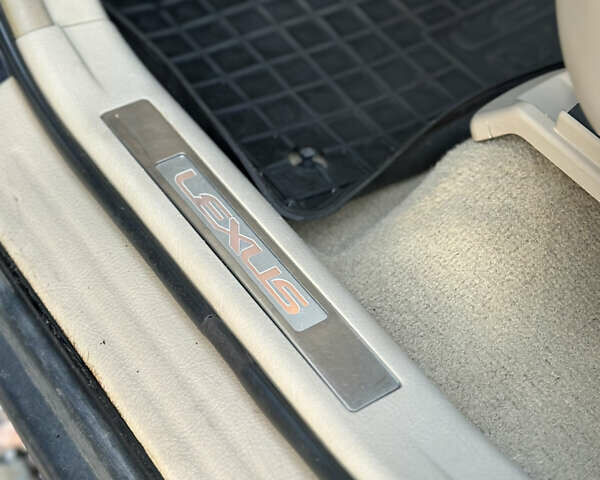 Черный Лексус РХ, объемом двигателя 3.46 л и пробегом 378 тыс. км за 8200 $, фото 11 на Automoto.ua